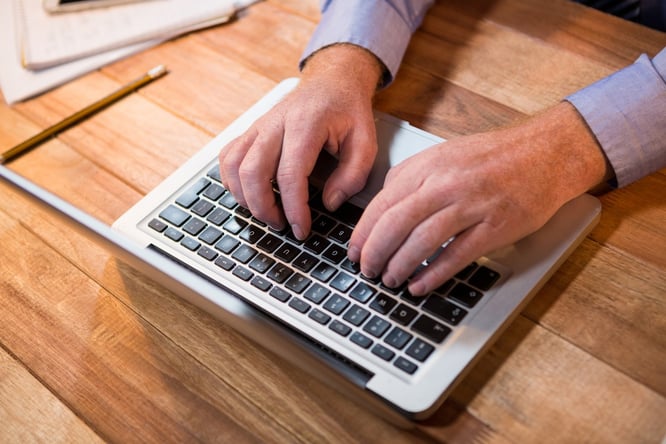 Businessman working on laptop in the office